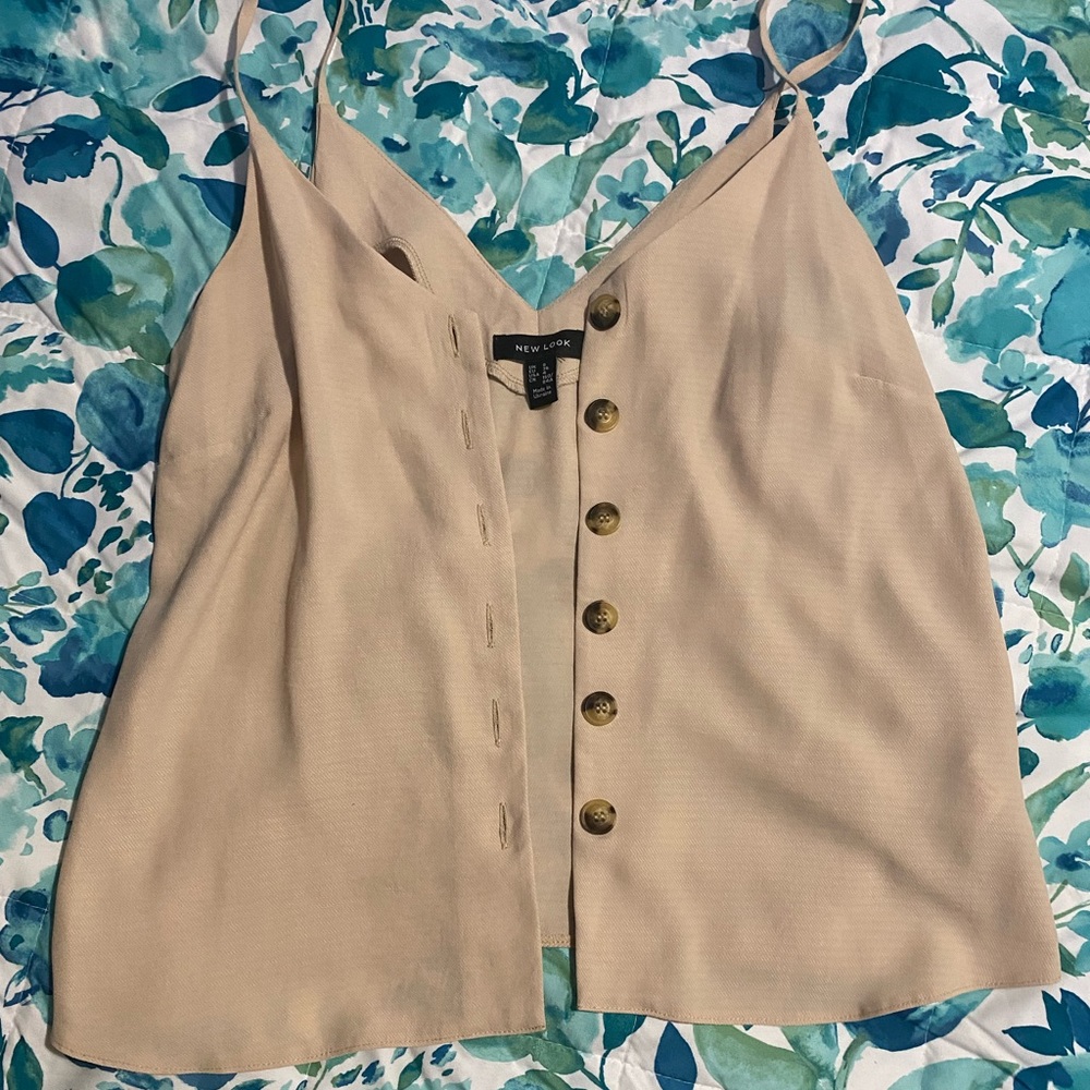 Only wore one, beige top
